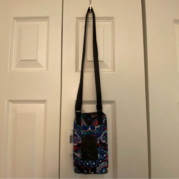 Vera Bradley Handbags - ‼️NWT‼️ Vera Bradley RFID Protection Phone Sling